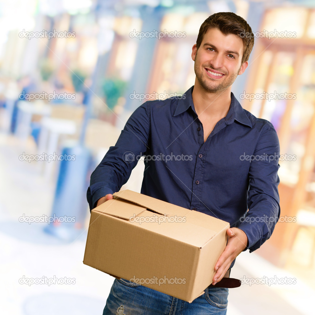 Young Man Holding Cardbox