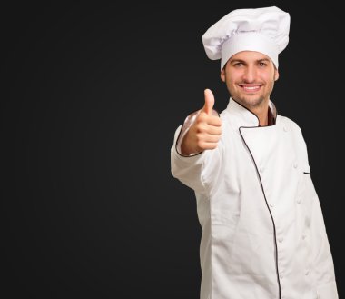 Male Chef Showing Thumbs Up Sign clipart