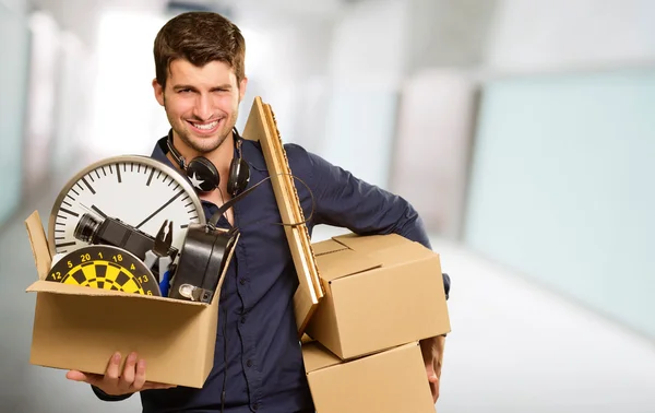 Young Man Holding Cardboxes Gesturing — Stock Photo, Image