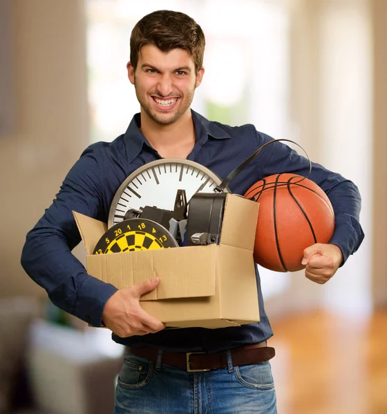 Happy Young Man Holding Cardbox Gesturing — Fotografie, imagine de stoc