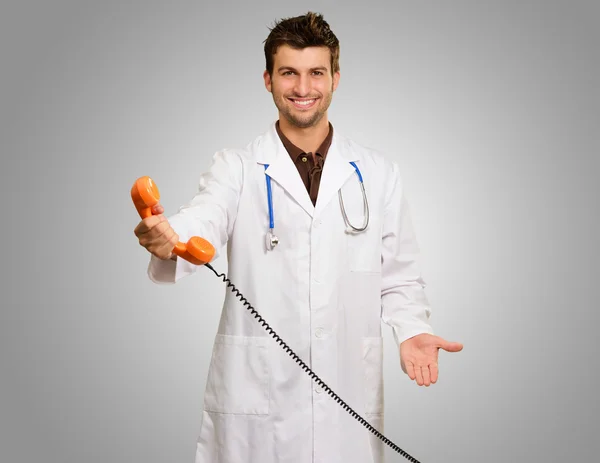 Portrait Of A Doctor Holding Telephone — Stock Photo, Image