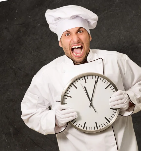 Male Chef Holding Wall Clock — Stock Photo, Image