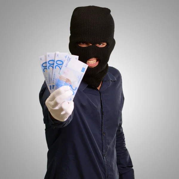 Inbreker die hij in gezichtsmasker — Stockfoto