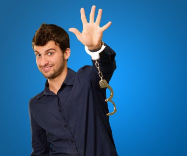 Man Wearing Handcuffs clipart