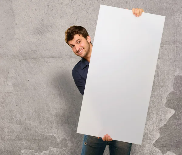 Young Man Holding Banner — Stock Photo, Image