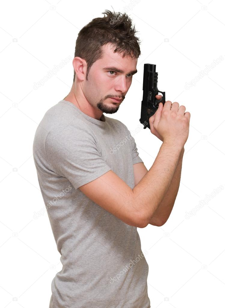 concentrated man holding gun