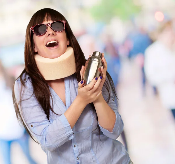Woman Wearing Neckbrace Holding A Shaker — Stockfoto