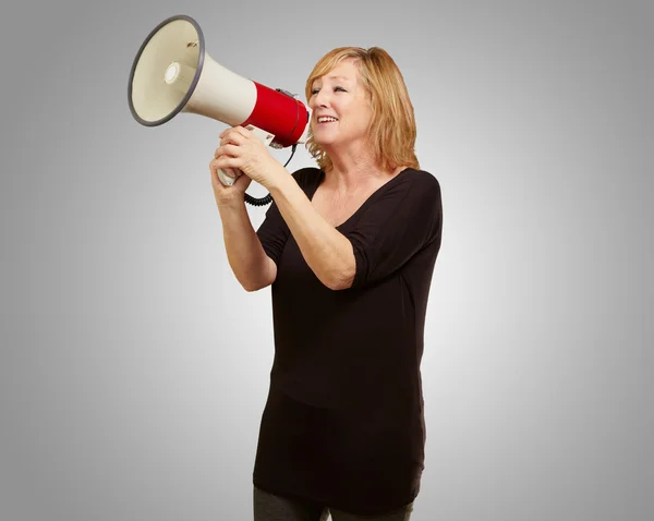 Mulher com megafone — Fotografia de Stock