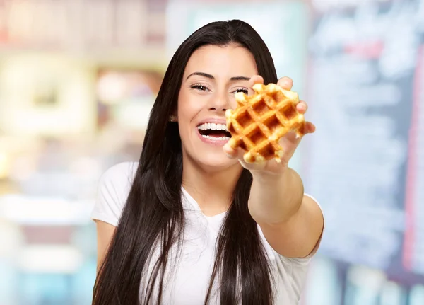 A Young Woman Holding And Showing At Waffle — Stock Photo, Image