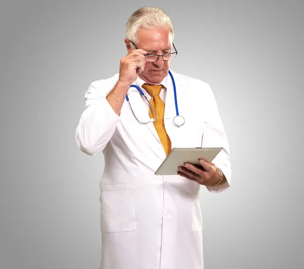 Portrait Of A Male Doctor Holding A Tab — Stock Photo, Image