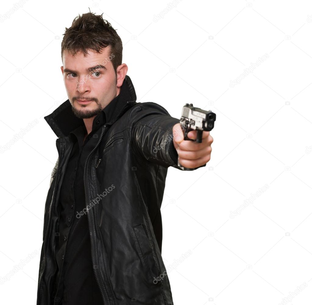 handsome man pointing with gun