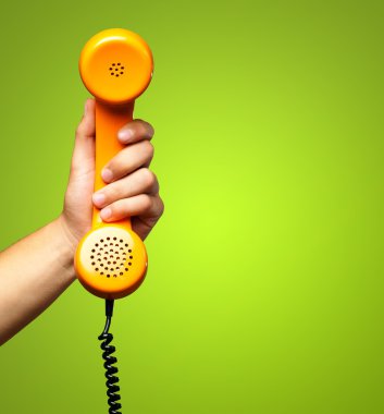 Close Up Of Hand Holding Telephone clipart