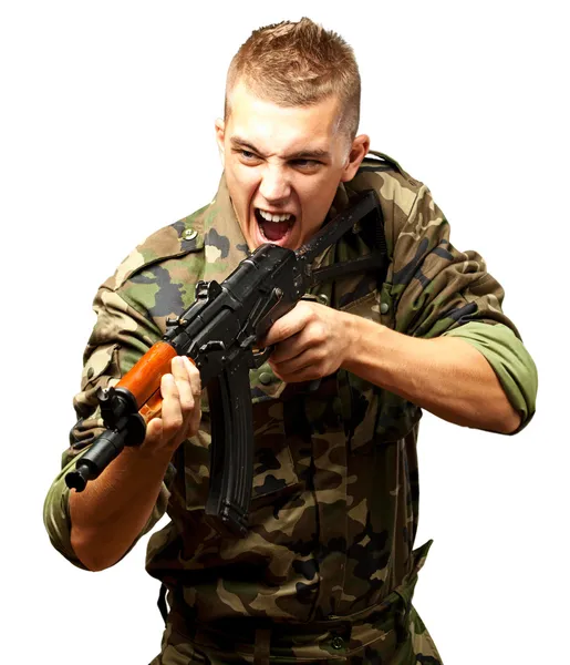 Portrait of an angry soldier aiming — Stock Photo, Image