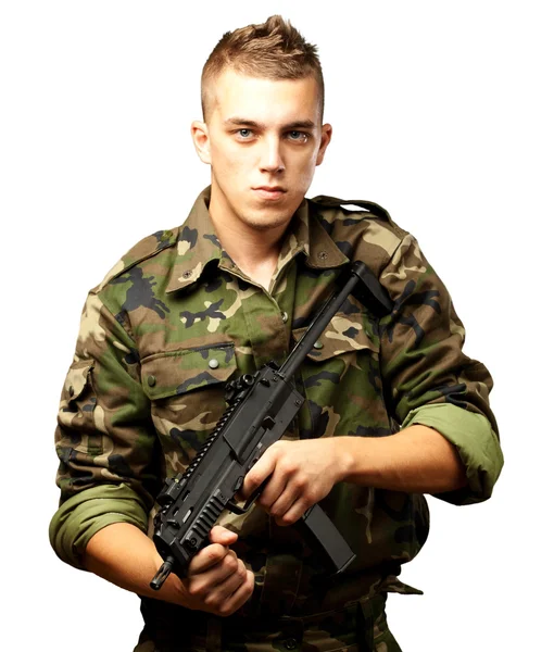 Schöner Soldat mit Waffe — Stockfoto