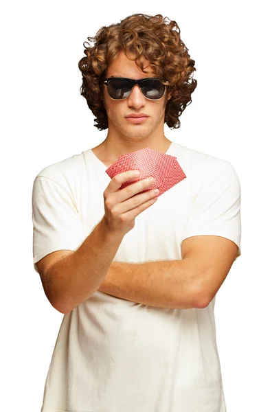 Человек, держащий несколько игральных карт — стоковое фото