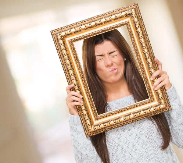Portrait Of A Young Woman Holding Frame — Stock Photo, Image