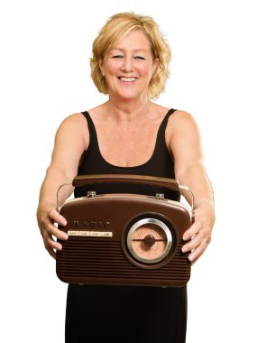 Happy Mature Woman Holding Radio