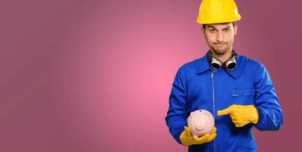 Ingegnere Holding Piggy Bank — Foto Stock