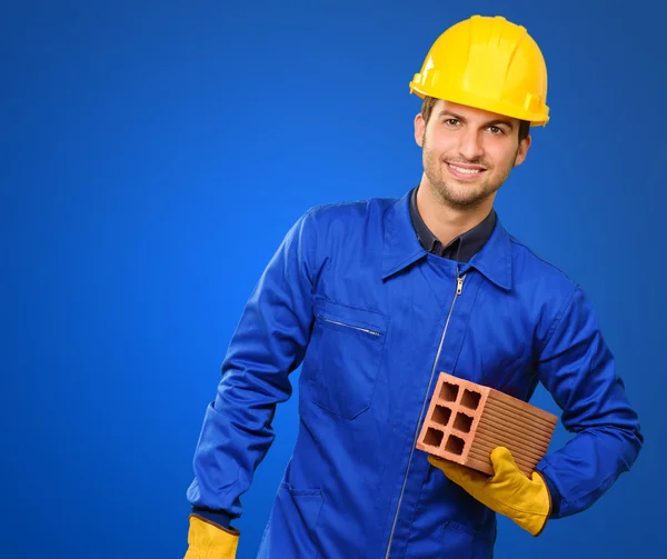 Felice ingegnere Holding Brick — Foto Stock