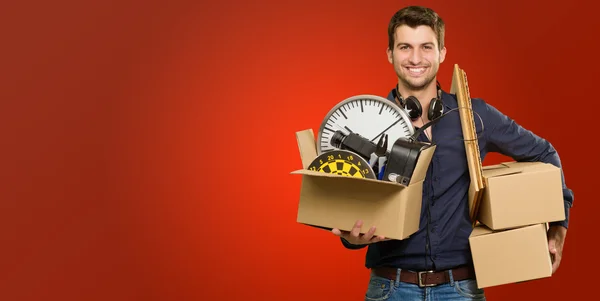 Happy Young Man Holding Cardboxes — Stock Photo, Image