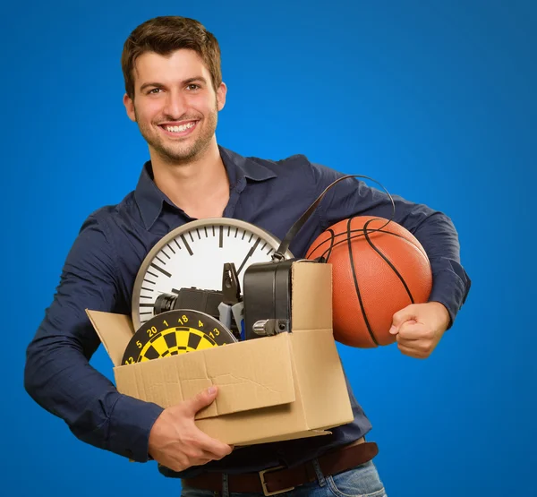 Happy Young Man Holding Cardboxes Gesturing — Stock Photo, Image