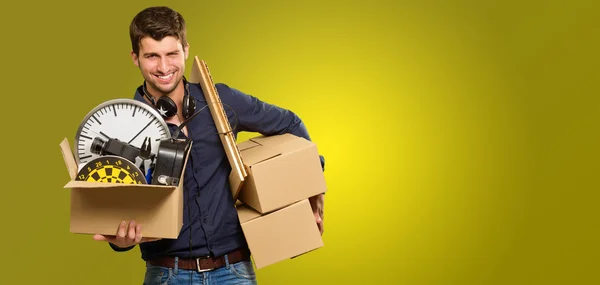 Man Holding Cardboard Box And Picture Frame — Stock Photo, Image