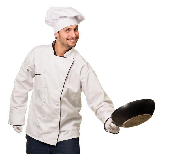 Портрет мужчины-шеф-повара, держащего в руках пан — стоковое фото