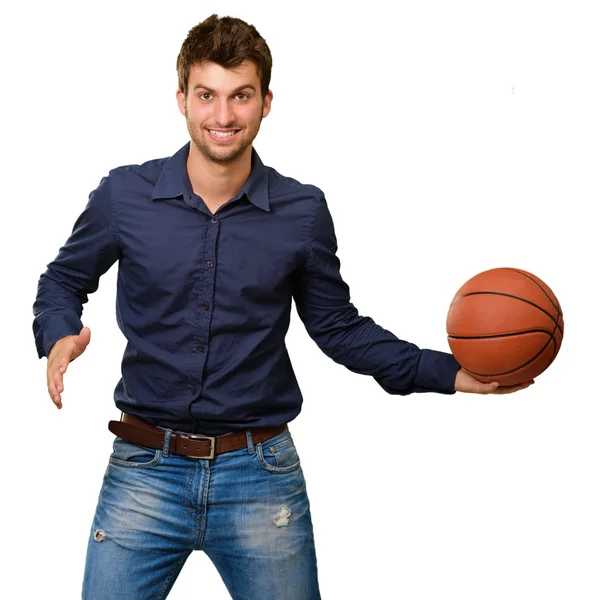 Jovem segurando basquete — Fotografia de Stock