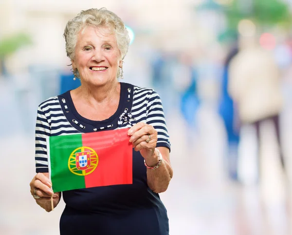 Happy Senior Woman Holding Spain Flag — ストック写真