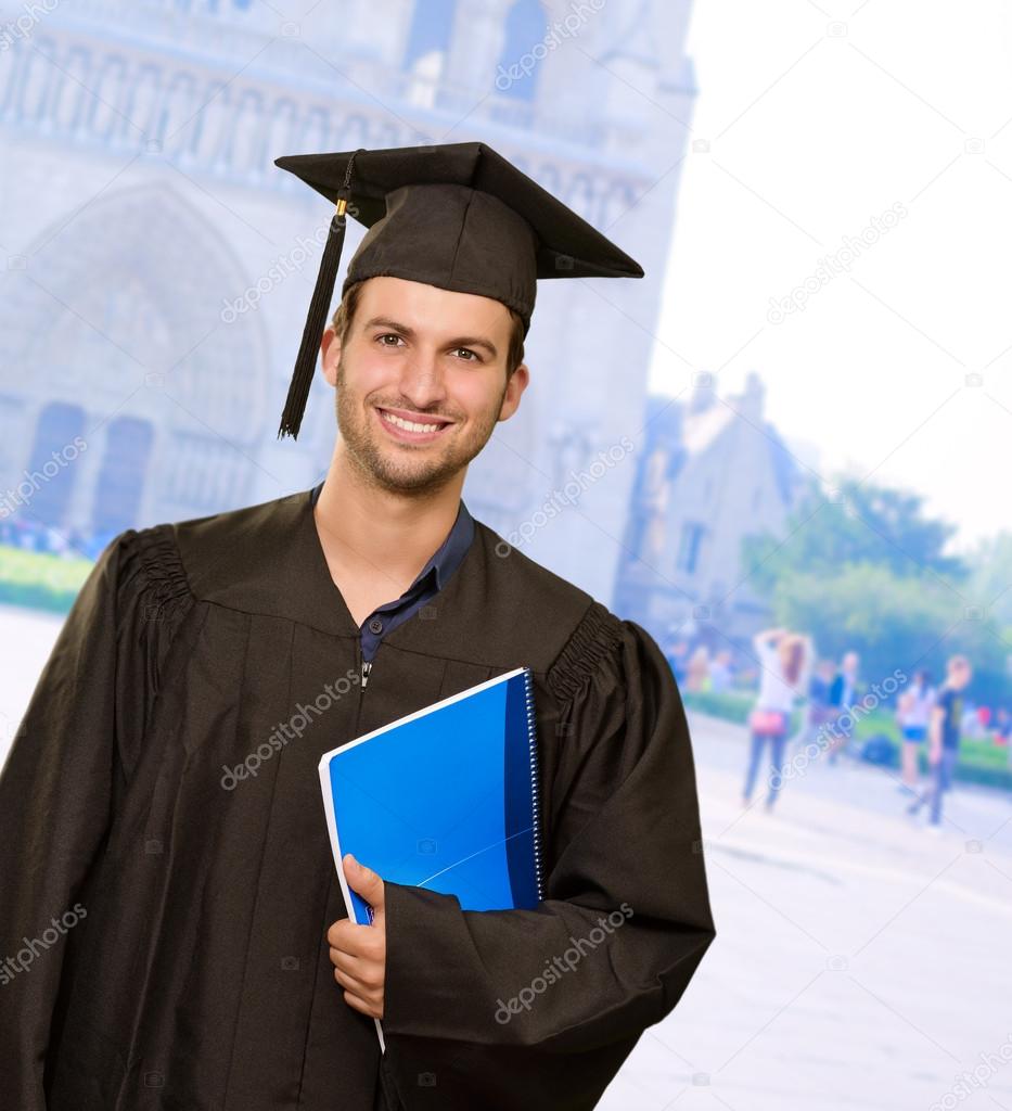 Happy Graduate Man Holding Book