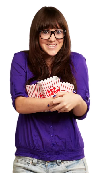 Vrouw bedrijf leeg popcorn packet — Stockfoto