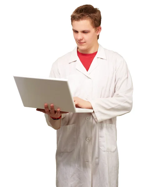 Portrait of a doctor surfing on laptop Stock Picture