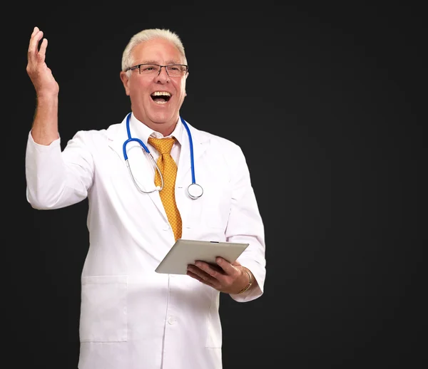 Doctor Holding A Tablet And Happy — Stock Photo, Image