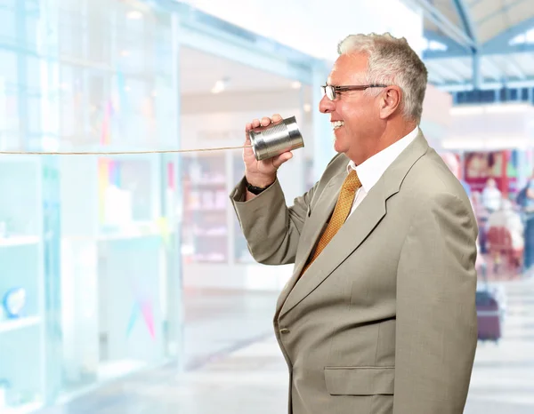 Senior Man Holding Tin — Stock Photo, Image