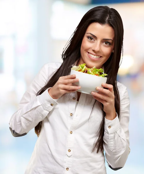 Young Girl Showing A Bowl Of Salad Stock Picture