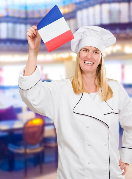 Happy Chef Holding French Flag