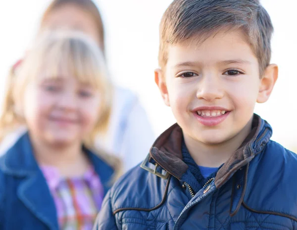 Happy Boy Standing In Front Of Girls — Stock Photo, Image