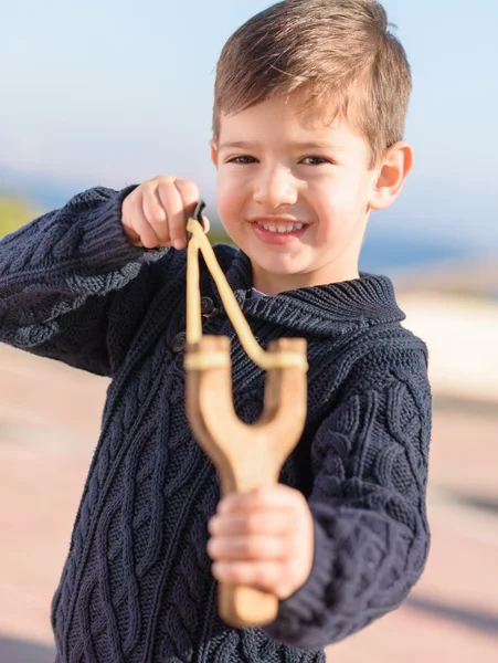 Boy Aiming With A Slingshot — Stock Photo, Image