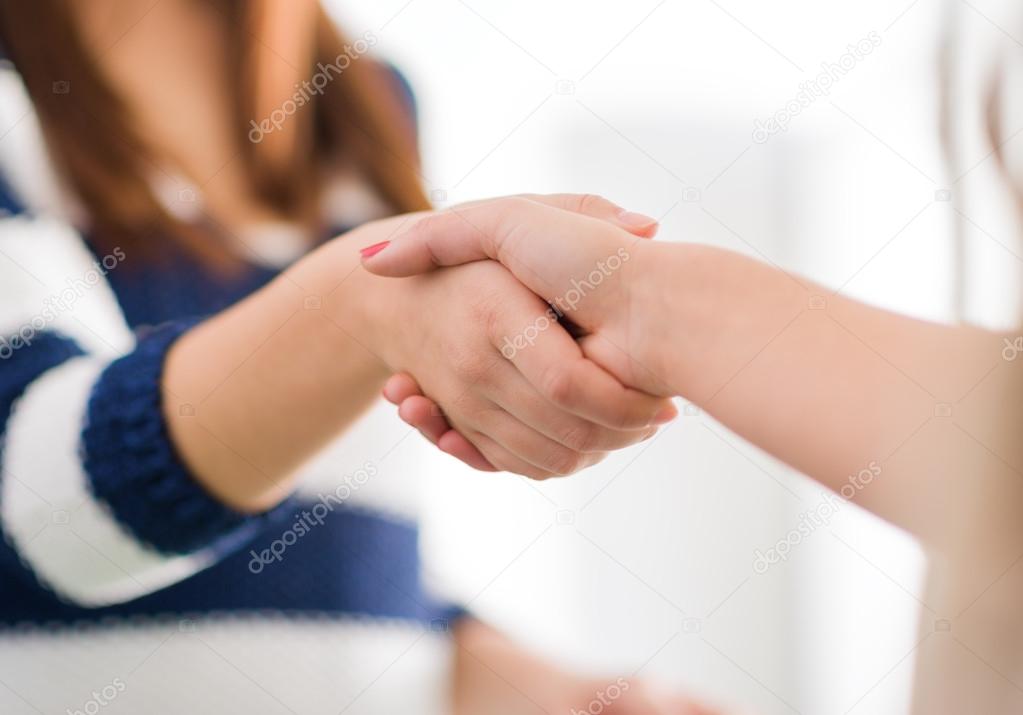 Two Women Shaking Hands Stock Photo by ©Krakenimages.com 22655213