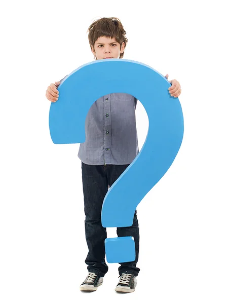 Chłopiec trzyma znak zapytania — Zdjęcie stockowe