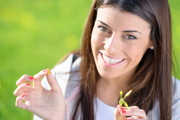 Young Woman Picking Leaf — Stock Photo, Image