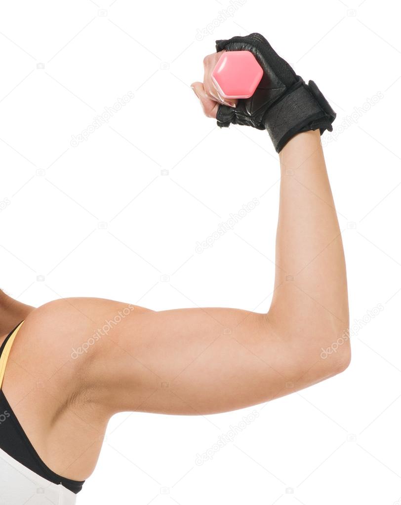 Close-up Of Woman's Hand Lifting Dumbbell