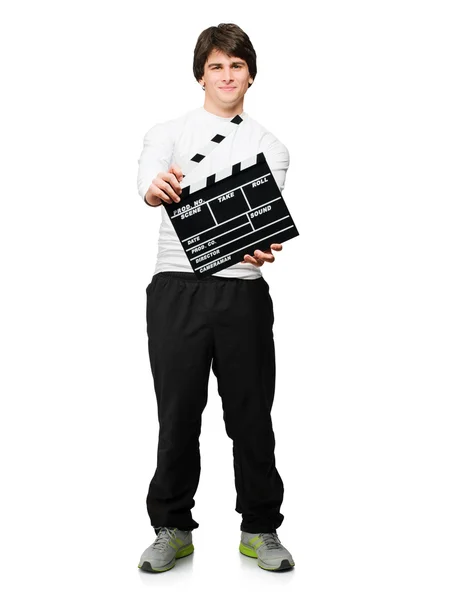 Giovane uomo tenendo Clapper Board — Foto Stock