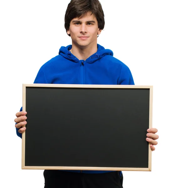 Mladý muž hospodářství Černá deska — Stock fotografie