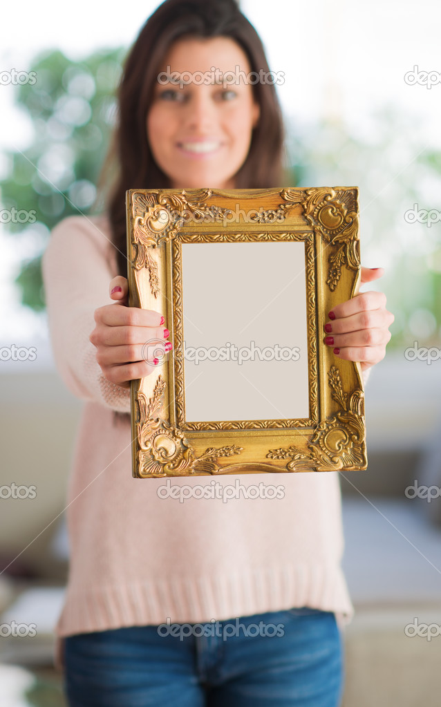 Happy Woman Holding Picture Frame