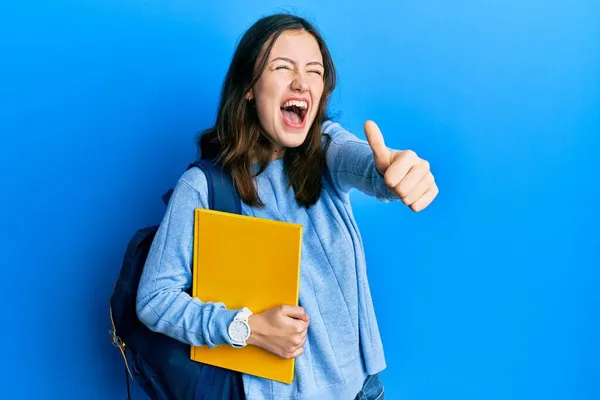 Young Brunette Student Woman Wearing Student Backpack Doing Thumbs Gesture — Stock Photo, Image