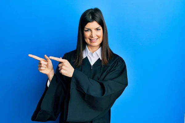 Young Hispanic Woman Wearing Judge Uniform Smiling Looking Camera Pointing — Stock Photo, Image