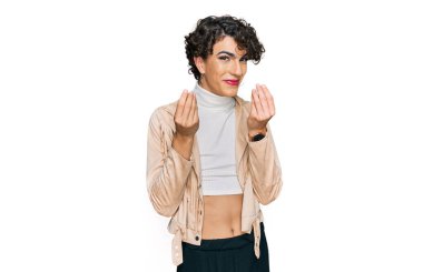 Handsome man wearing make up and woman clothes doing money gesture with hands, asking for salary payment, millionaire business 