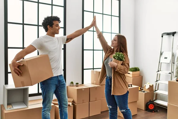 Young Couple Smiling Happy High Five Standing New Home — Stock Photo, Image