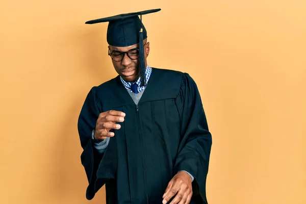 Young African American Man Wearing Graduation Cap Ceremony Robe Disgusted — Stock Photo, Image